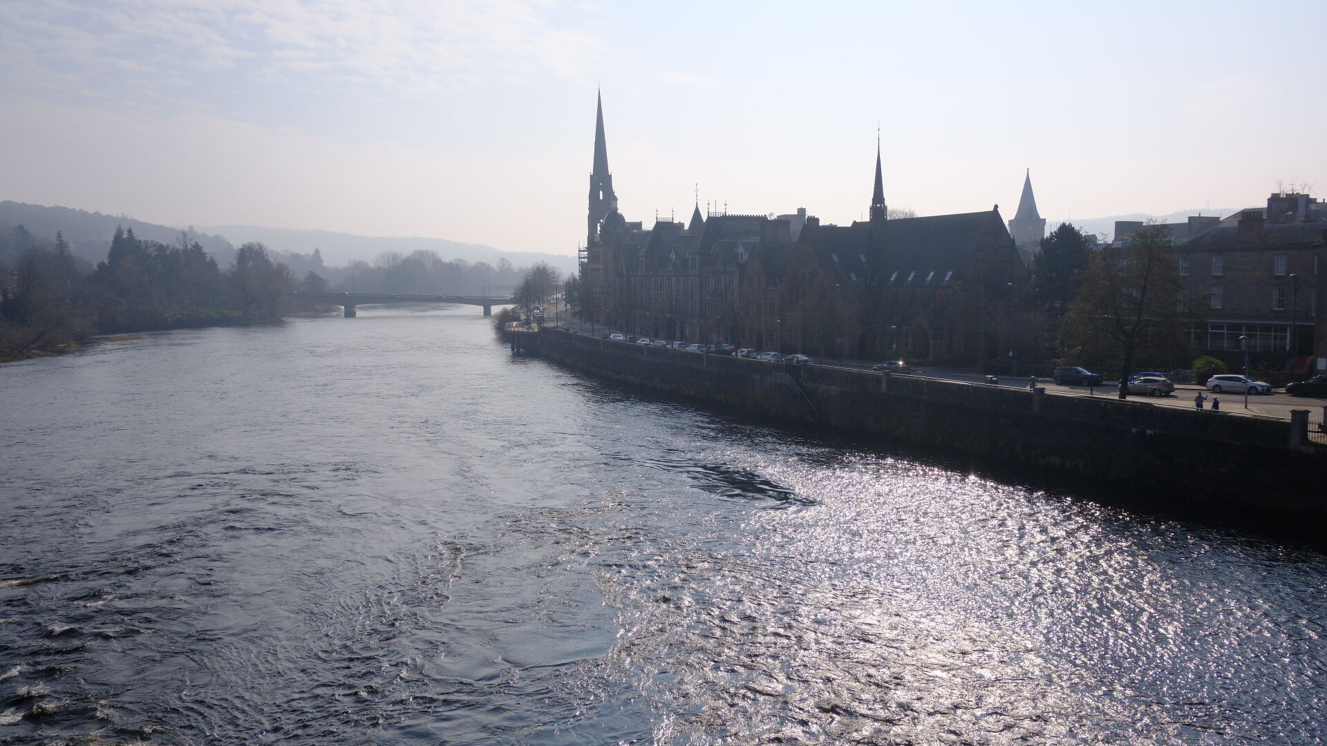 Wide expanse of the River Tay sweeping around Perth town centre.