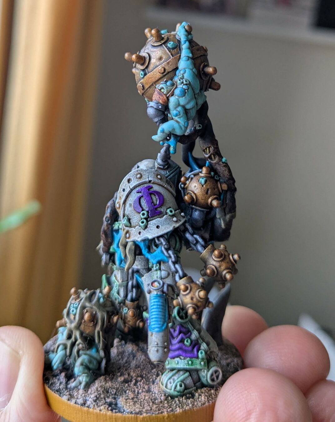 A close-up of the dredgeling with the gas mask.